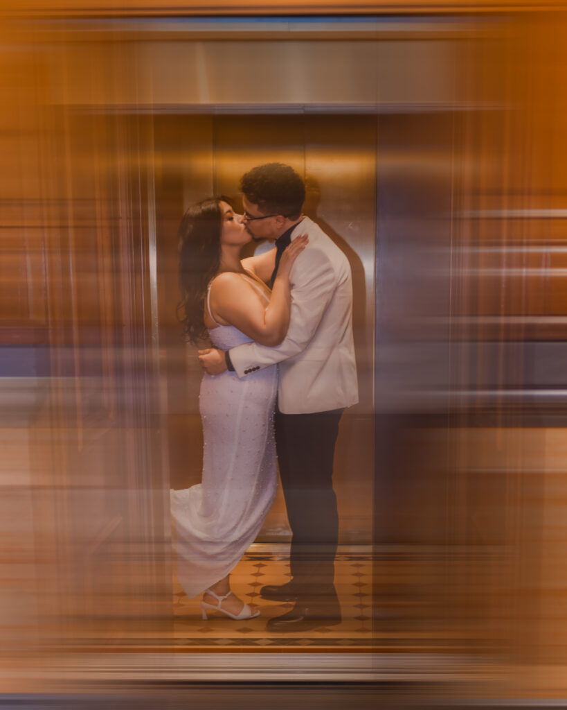 Engagement photos down town Des Moines Iowa Court ave elevator photo