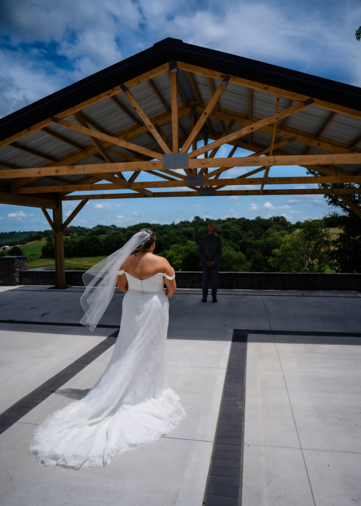 First look with dad at Bluebird Hill Iowa wedding venue