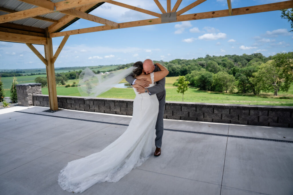 First look with dad at Bluebird Hill Iowa wedding venue