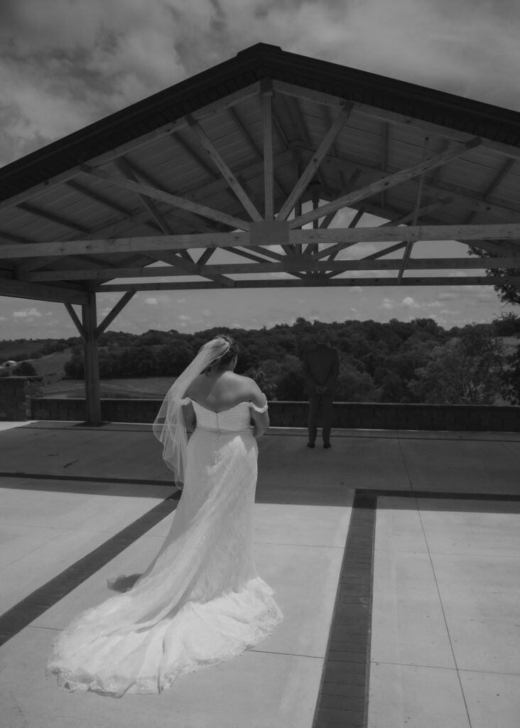 First look with dad emotional moment at Bluebird Hill Iowa wedding venue