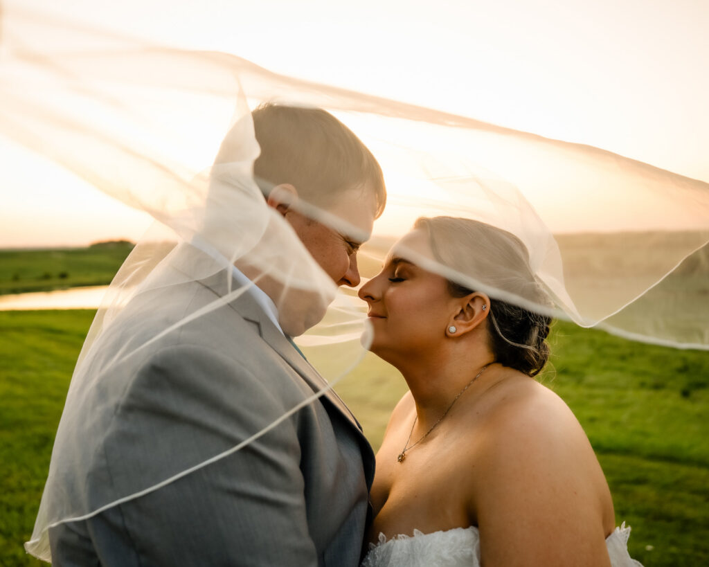 Sunset photos at Bluebird Hill Iowa wedding venue