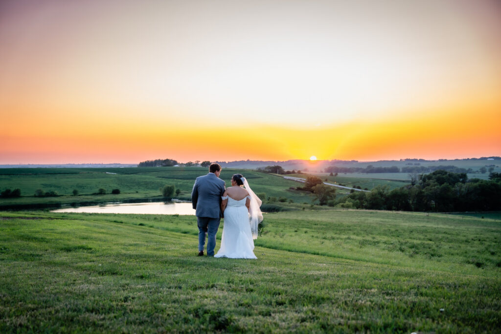 summer sunset photos at Bluebird Hill Iowa wedding venue