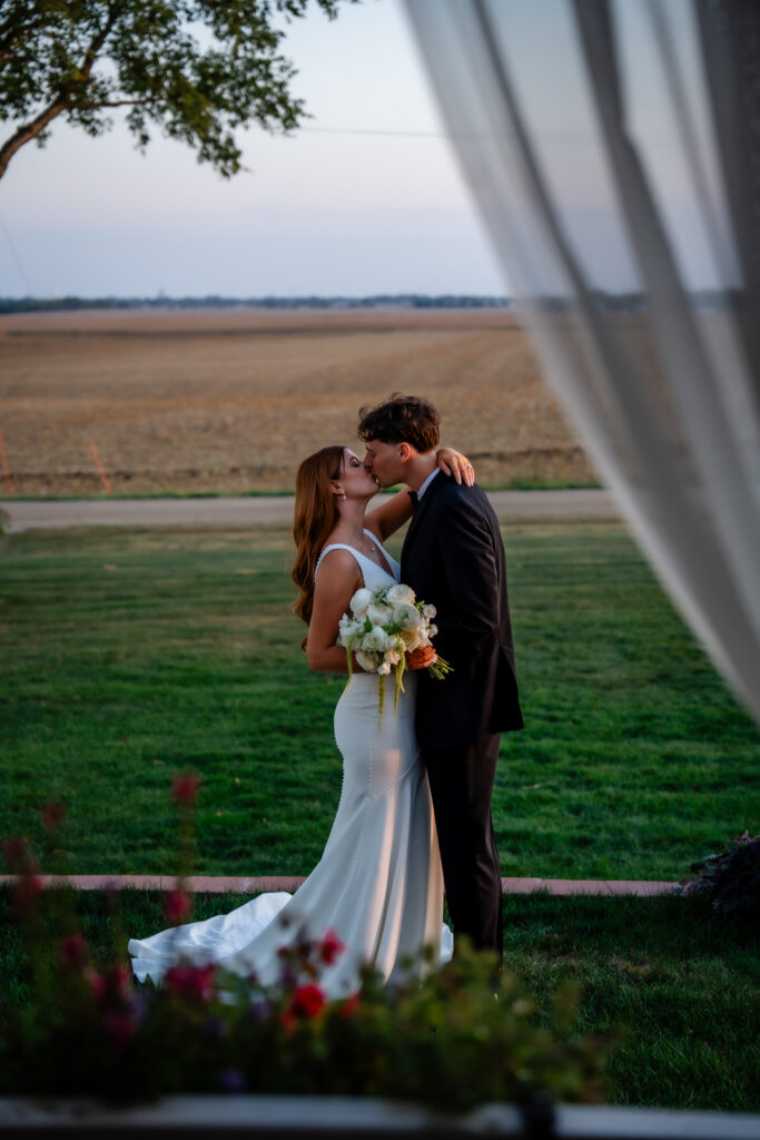 Romantic wedding photos at 1868 Farmhouse Iowa wedding venue