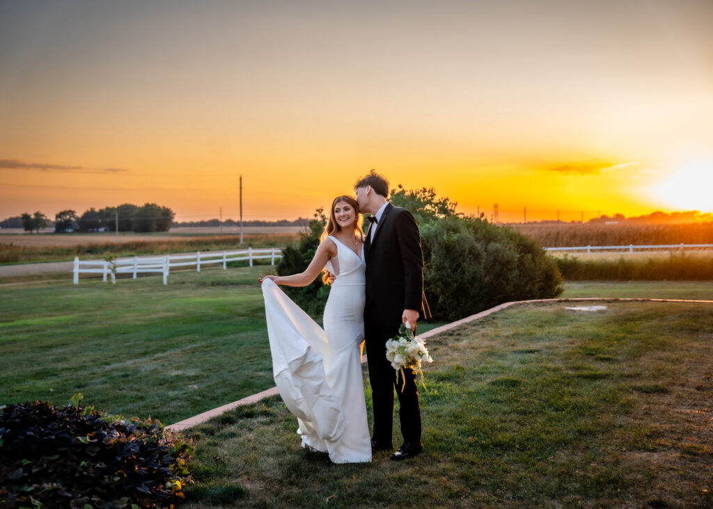Sunset wedding photo of bride and groom in Iowa
