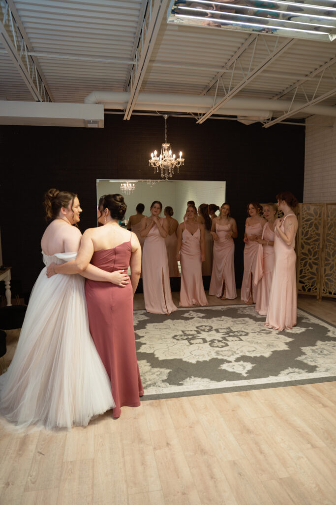 Bride and her mom getting ready before wedding at The Vineyard at St. Charles
