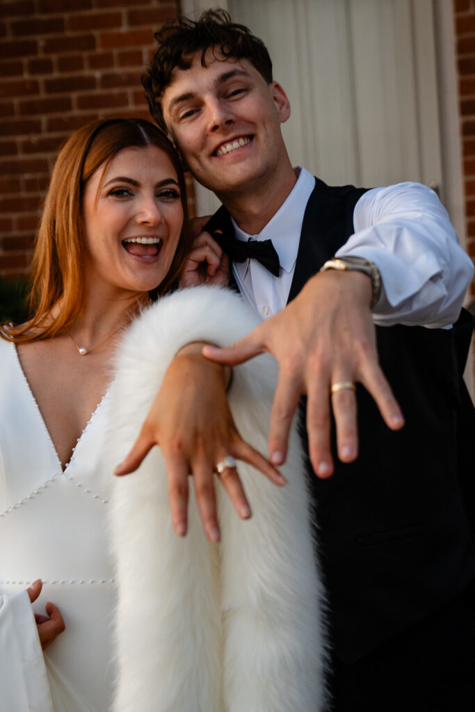 Excited Iowa couple wedding photos 1868 Farmhouse Iowa wedding venue