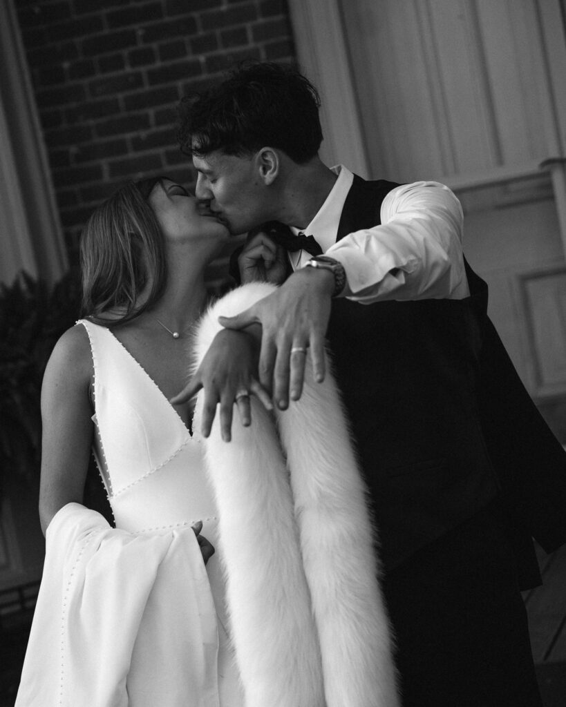 1868 Farmhouse Iowa wedding venue outdoor black and white couples photos