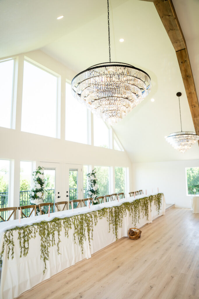 Reception space with huge chandeliers at Iowa wedding venue at The Vineyard at St. Charles