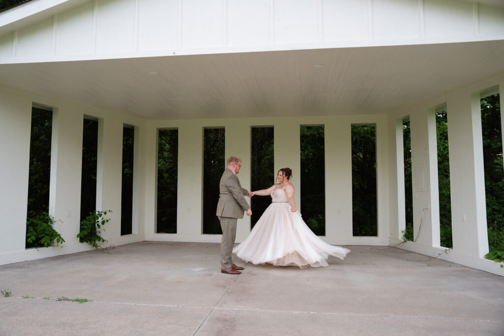 Couples photos outdoors at The Vineyard at St. Charles Iowa wedding venue of bride and groom on their wedding day