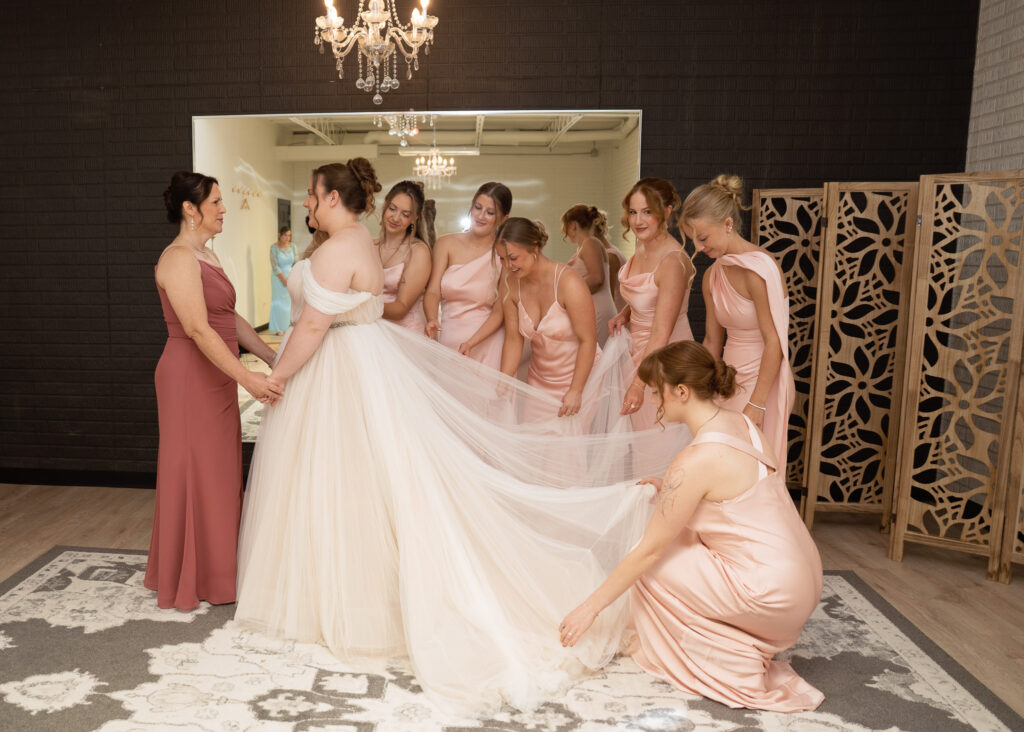 Bride and bridesmaids getting ready before wedding at The Vineyard at St. Charles