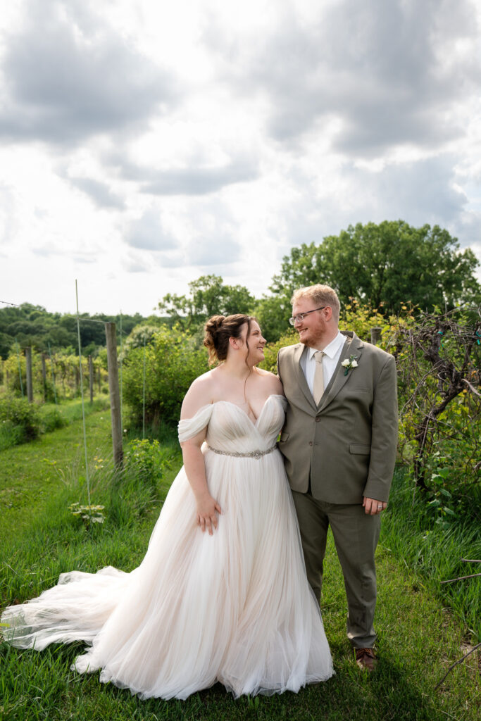 Couples photos at The Vineyard at St. Charles Iowa wedding venue of bride and groom on their wedding day
